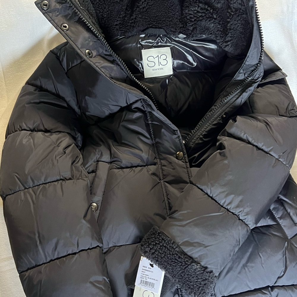 I’m selling a black XS S13 sweater New York